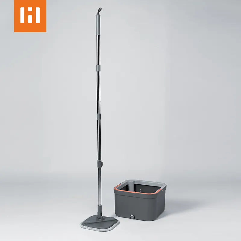 Rotating Mop and Bucket System Including Double Layered Mop
