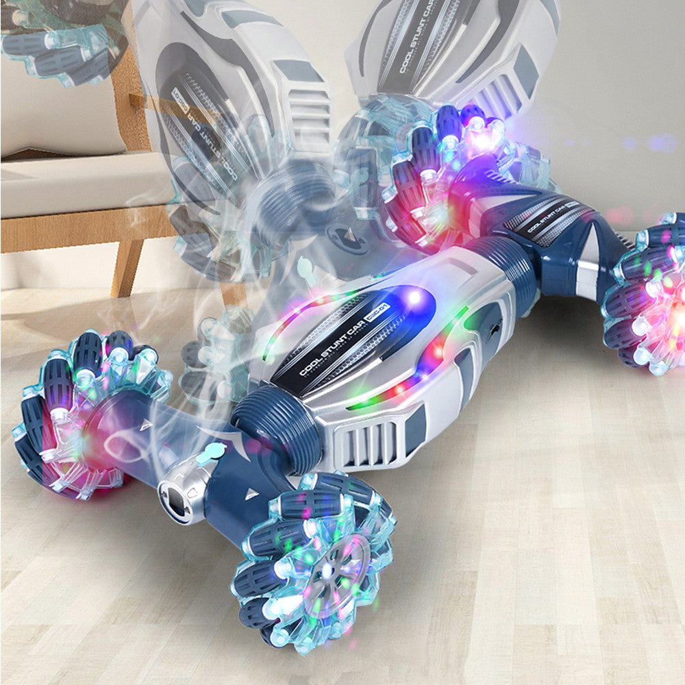 سيارة دفع رباعي مزودة بخاصية الرش وجهاز تحكم عن بعد بتردد 2.4 جيجاهرتز مع موسيقى وإضاءة وألعاب بهلوانية وسيارة تحكم عن بعد وسيارة لعبة مزودة بخاصية التحكم عن بعد