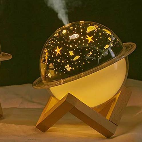 Creative Humidifier LED Projector is a humidifier and a beautiful desktop artwork